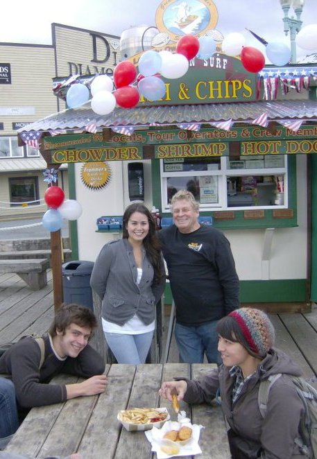 Scott & Ale in front of Alaskan Surf fish and chips in Ketchikan, AK