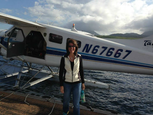 Rene jumping on a floatplane in Ketchikan Alaska