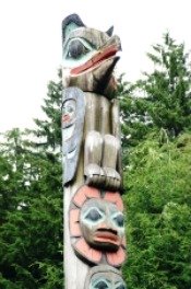 The Raven Stealing the Sun native american totem pole in downtown Ketchikan Alaska